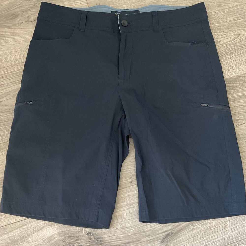 WindRiver outfitting Long Navy Blue Nylon Shorts with zippered  pockets.